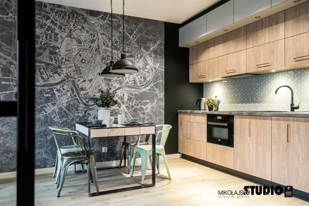 Nastrojowa jadalnia z aneksem kuchennym, proj. Mikołajska Studio