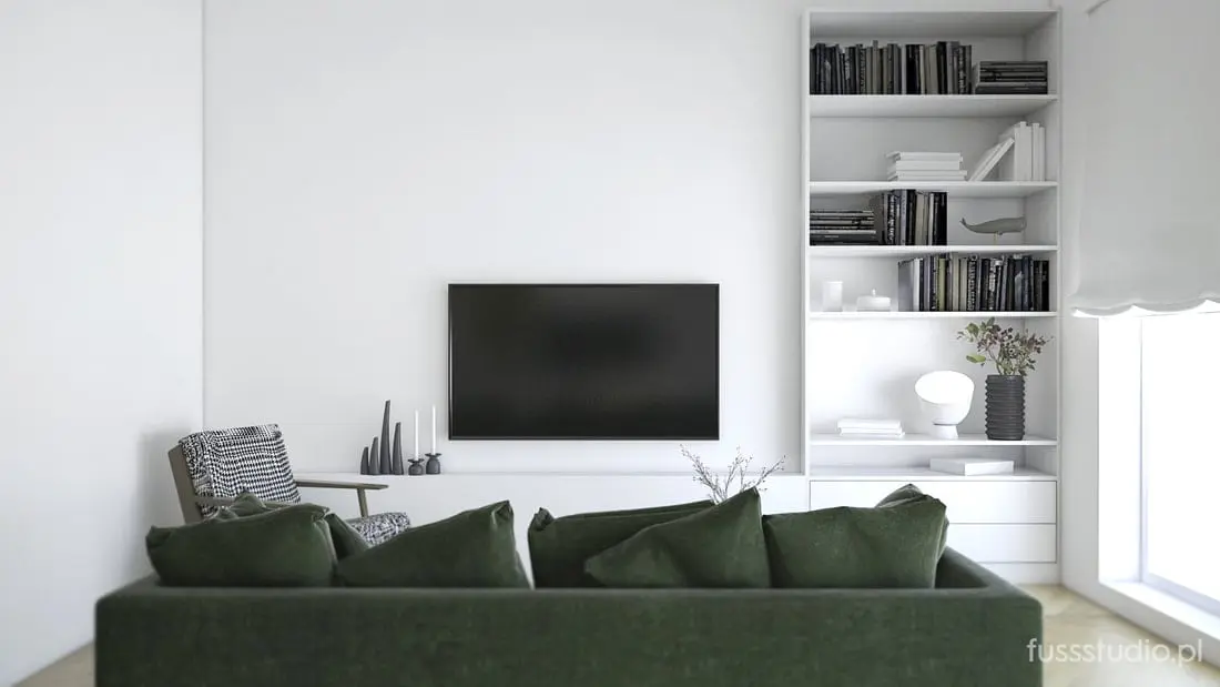 Salon z zieloną welurową sofą | Fuss Studio 