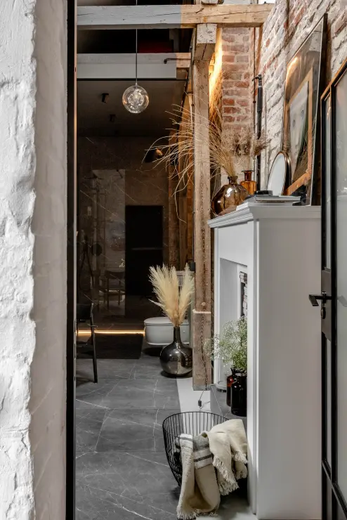 Loft z widokiem na dachy kamienic i PKiN